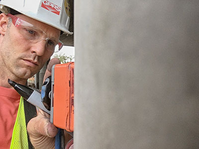 The picture above shows GPRS Project Manager, scanning the columns with a palm antenna. 